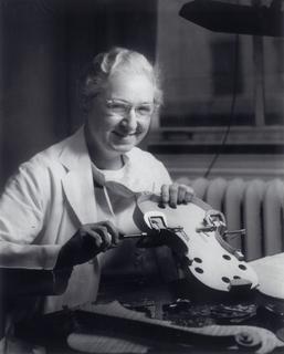 Virginia Apgar making a violin, 1960s