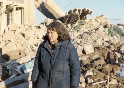 Susan Briggs surveying the damage after an earthquake in Armenia, 1989