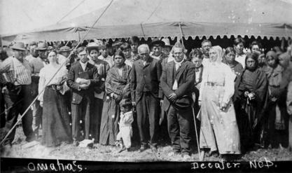 Susan La Flesche Picotte with members of the Omaha Nation on the reservation, 1910