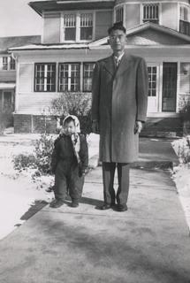 Rebekah Wang-Cheng as a young girl with her father, ca. 1955