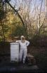 Barbara Barlow tending to her beehives, 1990s