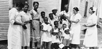 Two nurses visiting a community