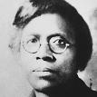 Full face photograph of Dr. Matilda Arabella Evans wearing glasses.